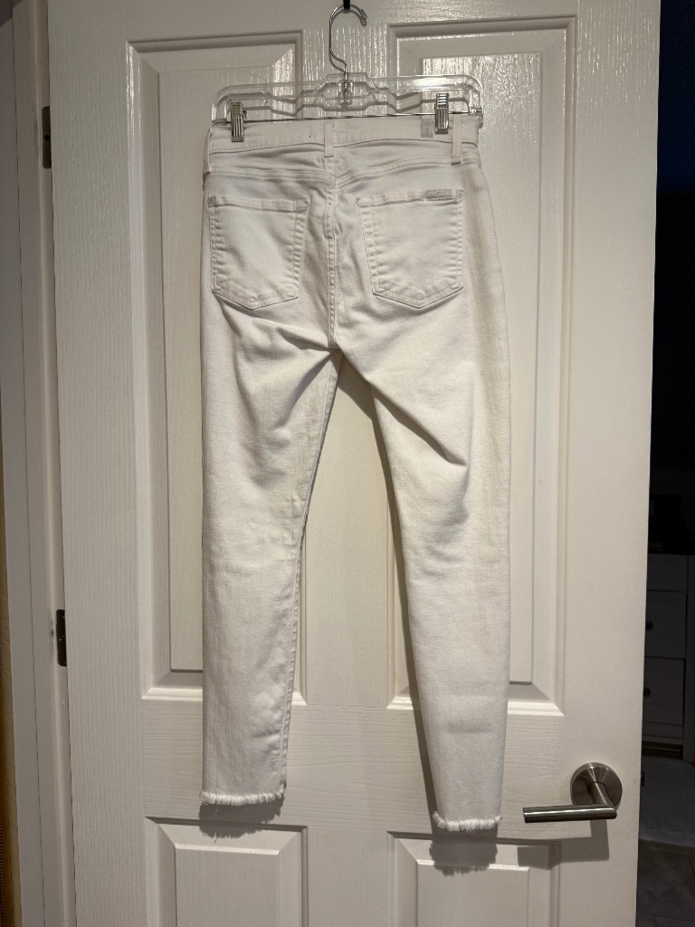 7 for All Mankind white denim pants.  Frayed bottom legs with front cut out.  26